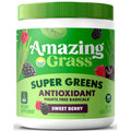 Container of Amazing Grass Super Greens Sweet Berry supplement on a white background