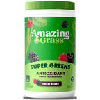 Amazing Grass Super Greens supplement container with green lid and label on a white background