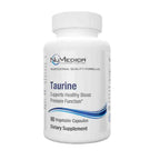 A white plastic bottle of NuMedica Taurine dietary supplement with a white cap, featuring blue and black text on a clean white background.