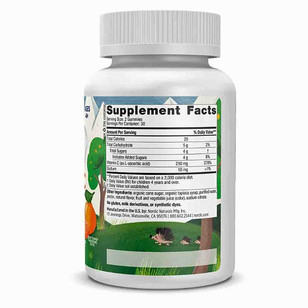 A white plastic bottle of Nordic Naturals K2+ Vitamin D3 supplement with a ribbed white cap, featuring a green and white label with supplement facts and illustrations of grass and fish.
