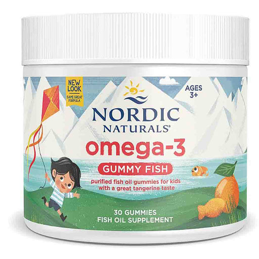 A white plastic jar of Nordic Naturals Omega-3 Gummy Fish supplement, featuring a colorful label with illustrations of a child flying a kite, mountains, a fish, and oranges.