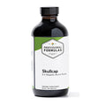 Bottle of 'Skullcap' dietary supplement with a white label on a white background