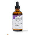 Bottle of Trace Mineral Complex supplement with dropper on a white background