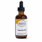 Bottle of 'Vegetable Mix' homeopathic remedy with a dropper labeled 'Professional Formulas' on a white background.