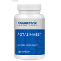 A white plastic bottle of Progressive Laboratories Potasinase dietary supplement with a blue and white label, containing 100 capsules.