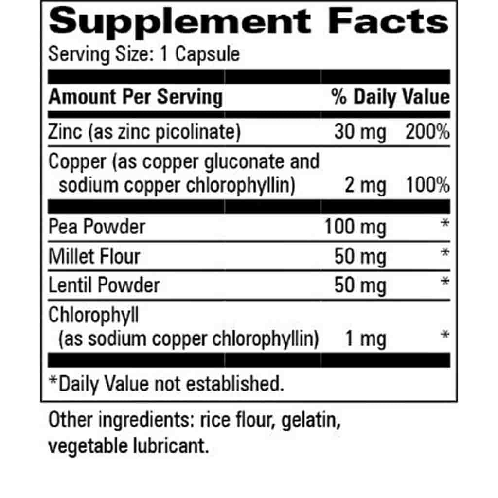 A black and white Supplement Facts label showing the nutritional content of a dietary supplement capsule, including zinc, copper, pea powder, millet flour, lentil powder, and chlorophyll.