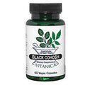 A dark green glass bottle of Vitanica Black Cohosh dietary supplement with a black ribbed cap and a white label featuring green leaf graphics.