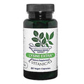 A dark green bottle of Vitanica Lysine Extra dietary supplement with a white label and green leaf graphic, on a plain white background.