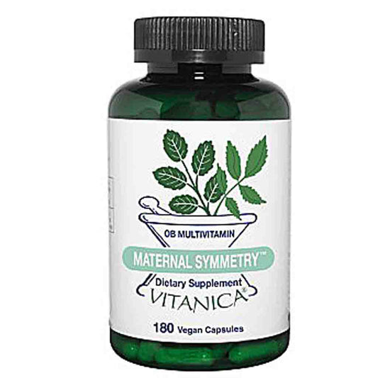A bottle of Vitanica OB Multivitamin 'Maternal Symmetry' dietary supplement. The product is in a dark green translucent bottle with a black ribbed cap and a white label featuring green leaf graphics and text.