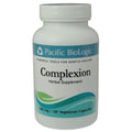 A bottle of Pacific Biologic Complexion herbal supplement with 120 vegetarian capsules for gentle healing.