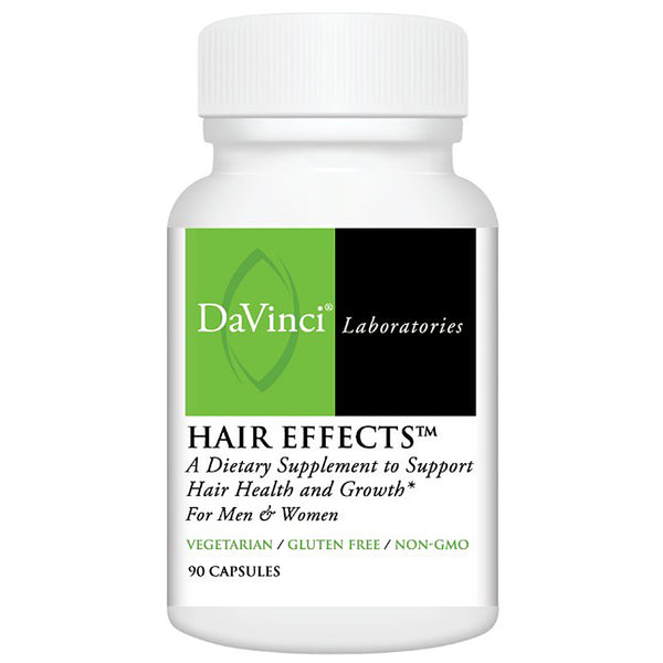 A white plastic bottle of DaVinci Laboratories Hair Effects dietary supplement with a green and black label, on a plain white background.