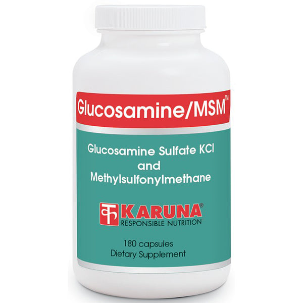 Supplement bottle labeled 'Glucosamine/MSM' by Karuna on a white background