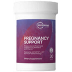 A white plastic bottle of Microbiome Labs Pregnancy Support dietary supplement with a purple and magenta label, containing 30 capsules.