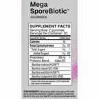A supplement facts label for Mega SporeBiotic Gummies, showing serving size 2 gummies, 30 servings per container, with a list of probiotic strains including Bacillus indicus, Bacillus clausi, Bacillus subtilis, and Bacillus coagulans. The label is black text on a white background with a gray vertical band and pink speckled side accents.