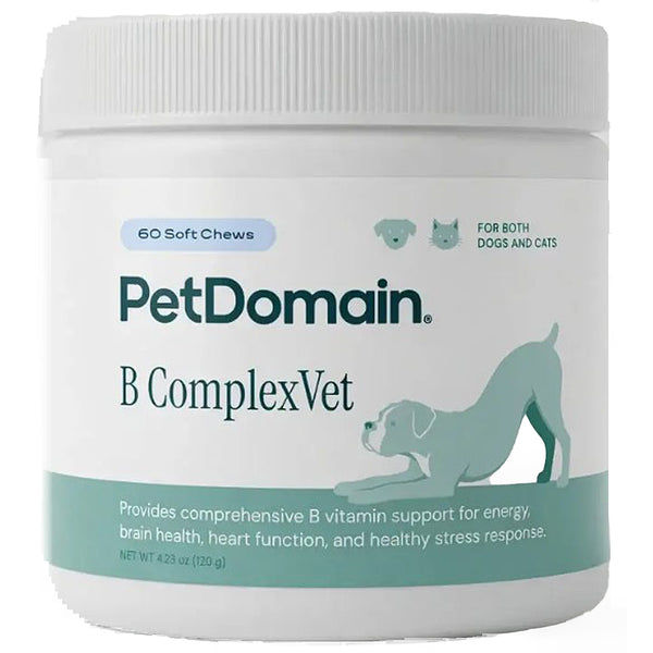 A white plastic tub of PetDomain B ComplexVet dog supplements with a white ribbed cap, featuring a label with teal and dark green text and graphics of a dog and cat.
