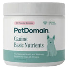A white plastic jar of PetDomain Canine Basic Nutrients with a white screw-top lid, featuring a label with teal and pink text and a light teal dog illustration.