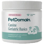 A white plastic jar of PetDomain Canine Geriatric Basics for senior dogs, featuring a white ribbed lid and a label with teal and pink accents.