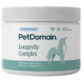 A white plastic tub of PetDomain Longevity Complex dog supplement with a ribbed white lid, featuring a teal dog silhouette and text on a clean white background.