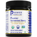 A black plastic jar of Premier Research Labs Premier Fermented Beets dietary supplement, featuring a white label with blue and yellow text and certification logos.