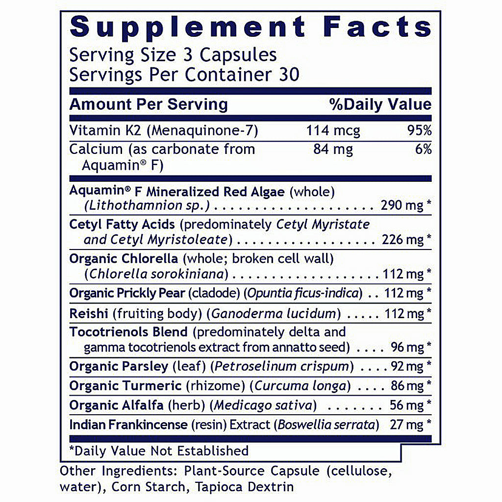 A close-up of a supplement facts label showing a supplement bottle's nutrition panel. The label lists ingredients such as Vitamin K2, Calcium, Aquamin F, and various organic chlorella and parsley extracts, with percentages of daily value and a note that daily value not established is marked with an asterisk.