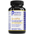 A black plastic bottle of Premier Research Labs Grassfed Colostrum-IgG dietary supplement with a white and blue label, shown on a plain white background.