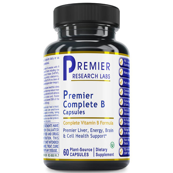 A black plastic bottle of Premier Research Labs Premier Complete B Capsules, featuring a white label with blue and gold text and accents, set against a plain white background.