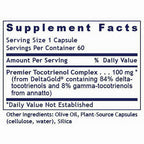 A close-up of a supplement facts label showing text for 'Premier Tocotrienol Complex 100 mg' with ingredients listed below, including olive oil, plant-source capsules, silica, and DeltaGold.