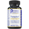 A bottle of Premier Research Labs Tranquinol dietary supplement with a black cap and a white label featuring blue and gold text, on a plain white background.