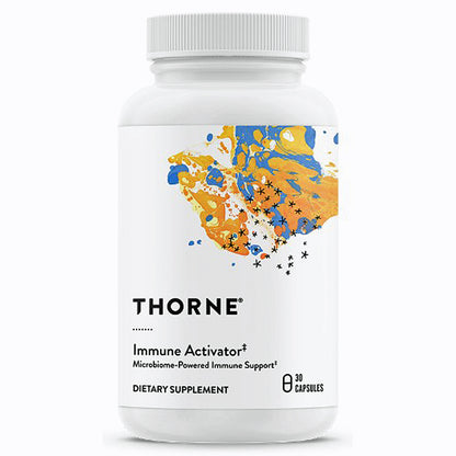 A white plastic bottle of Thorne Immune Activator dietary supplement with a white cap, featuring a colorful abstract label with blue, orange, and yellow paint splatters and black text.