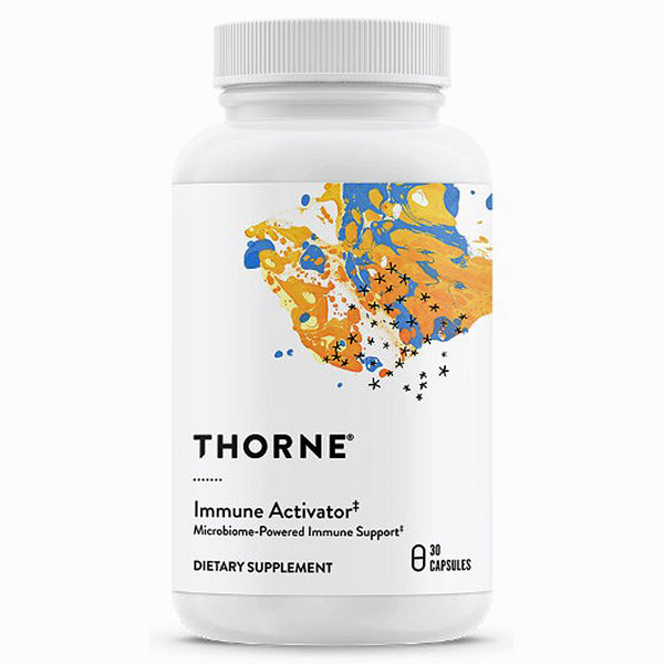 A white plastic bottle of Thorne Immune Activator dietary supplement with a white cap, featuring a colorful abstract label with blue, orange, and yellow paint splatters and black text.