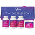 Microbiome Labs Total Gut Restoration gift set featuring three supplement bottles and one jar in front of a branded purple box.