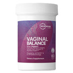 A container of Microbiome Labs Vaginal Balance dietary supplement, with a purple label and 60 capsules indicated.